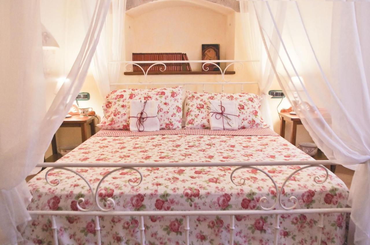 Dè Ajala - B&B de Charme Laconi Bagian luar foto