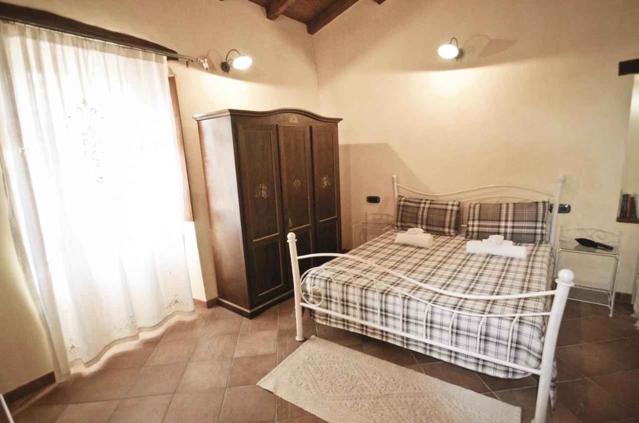 Dè Ajala - B&B de Charme Laconi Bagian luar foto